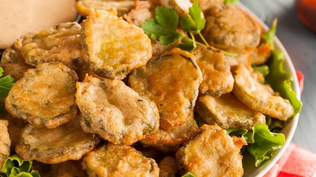 Fried pickles with green leaves