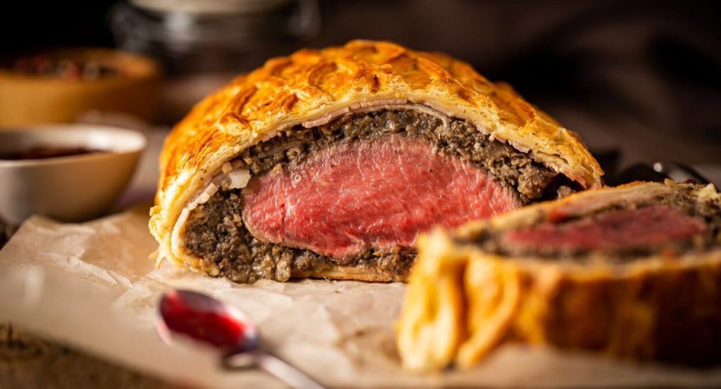 What is the best way to reheat a beef wellington